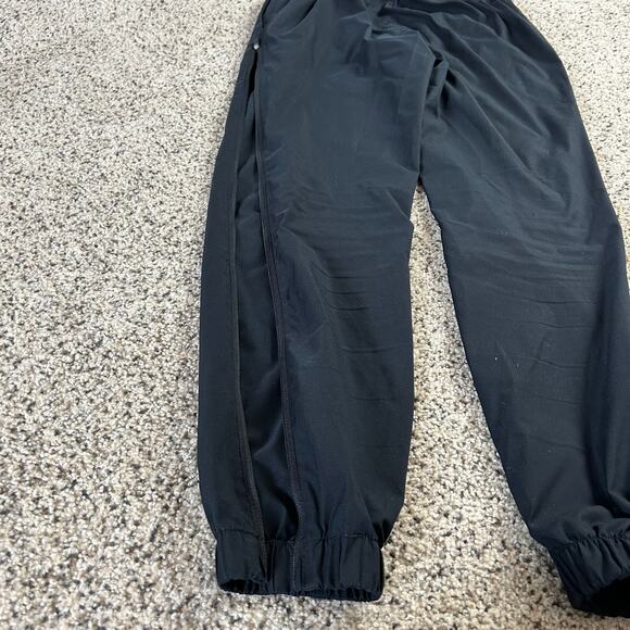 Nike Boys Black Windbreaker Track Pants Full Zip Leg Pants Size Small - Picture 2 of 7